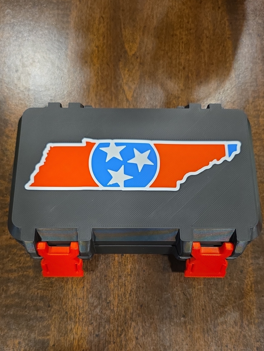 Black Golf Ball Storage Case with Tennessee Flag Decal and Red Latches